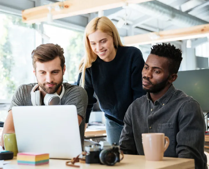 Agency professionals collaborating on client work